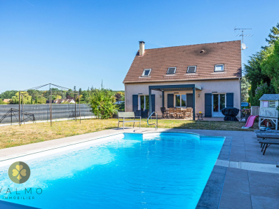 Belle maison traditionnelle avec piscine et un sous-sol total