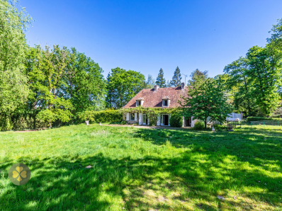 Demeure de caractère avec un grand garage de 190 m² au sol